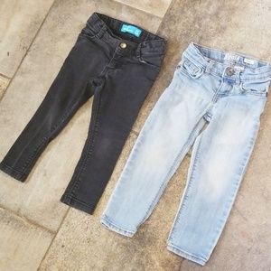 Two pairs of girls skinny jeans.